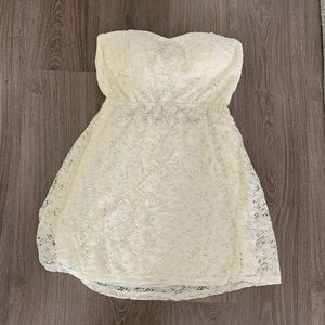 Lace strapless dress with bow cut out detail on the back